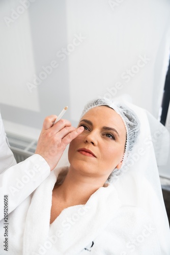 Woman receiving cosmetic treatment in a spa during daytime