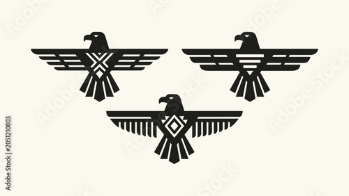 Obraz na płótnie Set of three geometric eagle thunderbird icons with spread wings and tribal patt