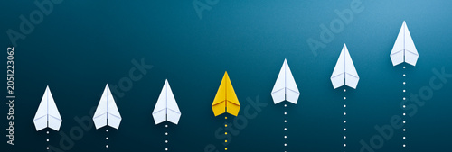 Yellow paper plane, Success in business growth concept.