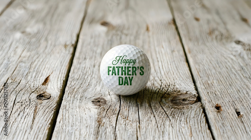 Happy father's day egg on wooden surface