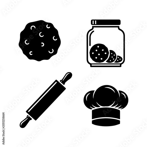 Baking scene with cookies, jar, rolling pin and chef hat on table