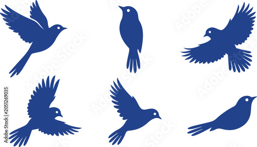 Set of blue bird silhouettes in various flying and perched poses