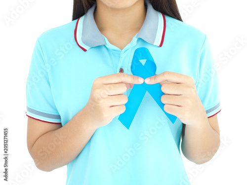 November Prostate Cancer Awareness month, woman holding blue ribbon for supporting people living and illness. World cancer day and health concept.