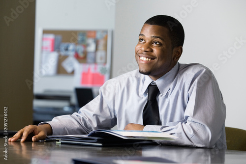 Business man smiling in an office