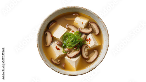 Foto Tofu and mushroom soup with scallions in a bowl