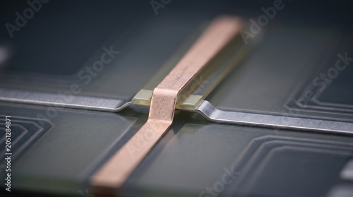 Metal trace crossover bridge on LED display backplane substrate