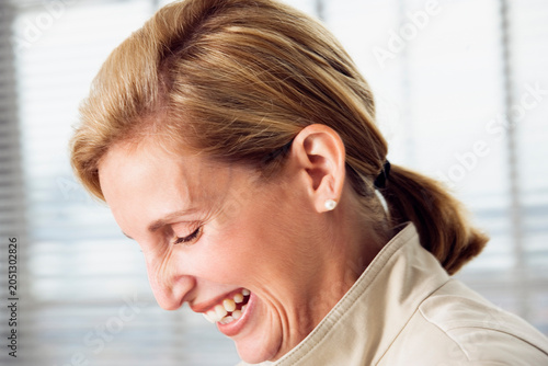 Business woman laughing