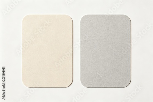 Minimalist blank rounded corner business card mockup template on clean white background with realistic paper texture, idea for branding presentation