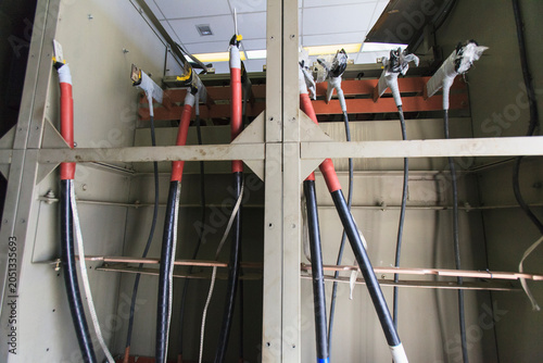 High current lines connecting to three phase bus at electric power plant