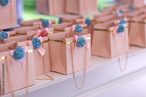 wedding, gift, decoration, party, box, sugared-almond, reception, celebration, bride and groom, event, ribbon, ceremony, white, guest, bow, package, flower, closeup, reminder, thank, appreciate, confe