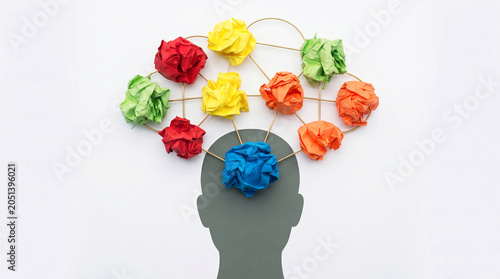 Head with a colorful crumpled paper brain network, representing mindfulness, brainstorming, creativity, and mental health