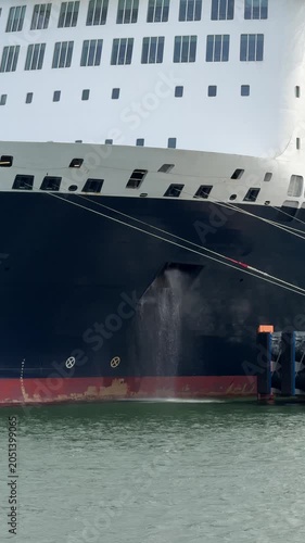 Large ship hull docked in Klaipeda harbor