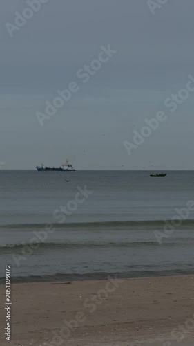 Fishing boats on calm Baltic Sea near Klaipeda