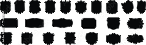 Tableau sur toile A collection of various black shield and badge shapes with thin white outlines a