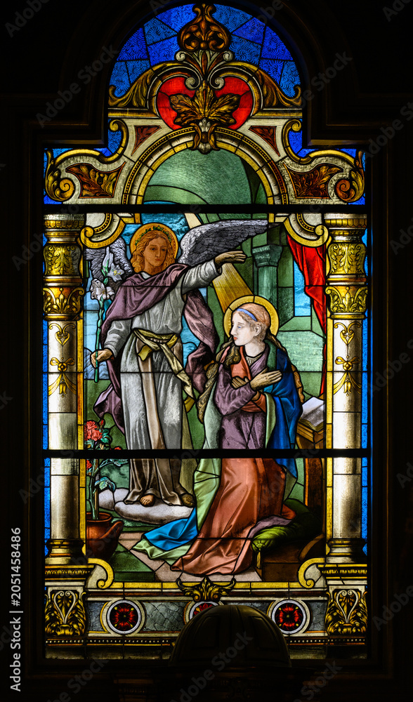 Naklejka premium Stained-glass window depicting the Annunciation of the Lord, Franciscan Church of the Annunciation of the Lord, Bratislava, Slovakia.