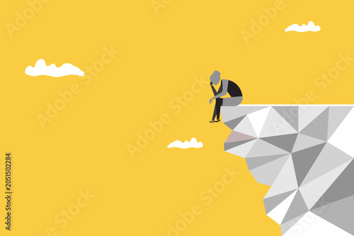 Foto Business crisis illustration showing worried professional sitting on cliff edge,