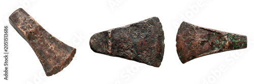 Fotografie A detailed collection of three ancient Bronze Age celts (axe heads), showing weathered metal textures and historical craftsmanship, isolated on a clean white background