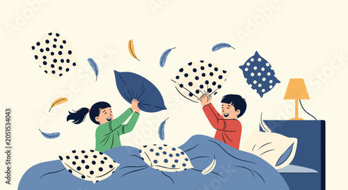 Two happy children having a playful pillow fight in bed with feathers and pillows flying through the air in a cozy bedroom setting at night.