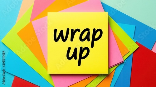 A colorful paper background featuring a yellow sticky note with words wrap up for meeting summaries.