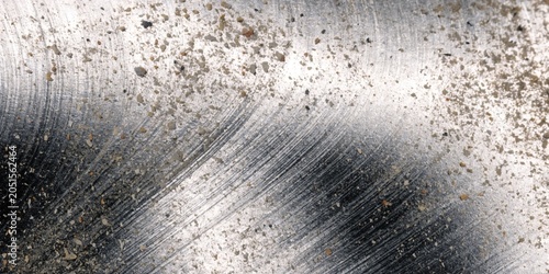 Metallic surface with granular texture and abrasion marks close up photographic detail abrasive aluminum alloy background blemish brushed