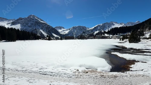 Frozen Lake in Arosa with Snow-Covered Alpine Mountains, Switzerland
