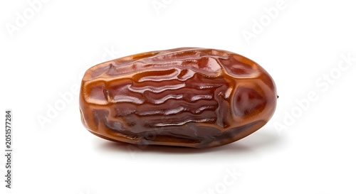 Single medjool date fruit isolated on white background