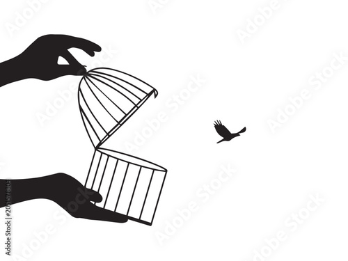 Schilderij op canvas Hands opening a birdcage with a flying bird a stark black and white silhouette h