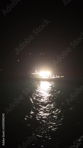Aerial View of Squid Fishing Boat with Bright Fishing Lights at Night in Hagi Japan, Vertical Marine Landscape 02