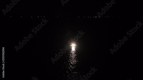 Aerial View of Illuminated Squid Fishing Boat at Night Offshore Hagi Japan, 4K Marine Industry Footage 04