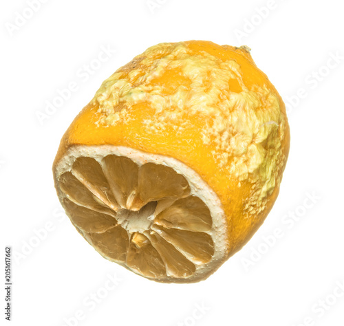 Rotten lemon with mold, isolated on white