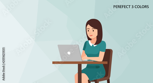 Woman Working on Laptop at Desk, Office Environment, Digital Communication