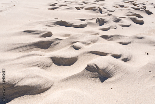 Sand beach texture and sand formations at the Lubiatowskie Dunes Beach, Baltic Sea, Lubiatowo, Poland