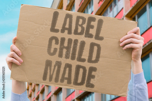 Bild auf Leinwand "Label child made" Clothing tag admits young production
