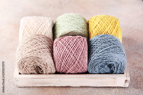 Skeins of yarn. Multicolored balls of cotton yarn. Yarn for knitting or crocheting. Hobby concept
