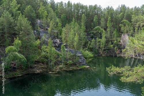 Photos Talkov Kamen or Talkov Stone is flooded quarry that formed lake in Sysert district, Sverdlovsk region, Russia