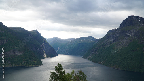 Green Misty Mountain and Glacier landscapes near Briksdal Glacier in Norway
