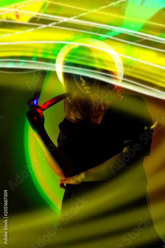 Girls experience in the metaverse with VR in fantasy vibrant neon background. Girls journey through the metaverse virtual neon digital reality.