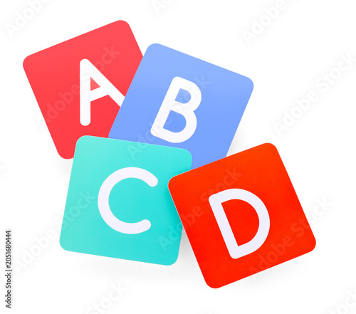 Colorful cards with letters isolated on white, top view