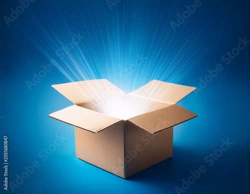 open cardboard box with glowing light beams shining from inside on blue background symbolizing mystery surprise or discovery concept