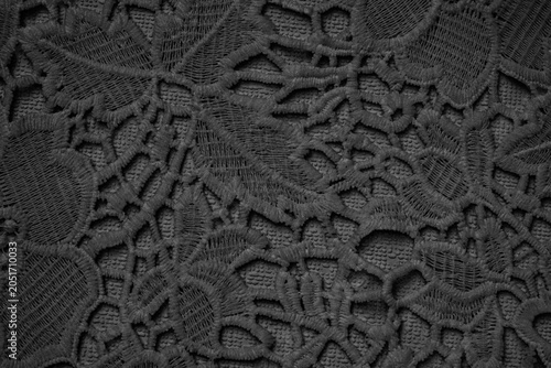 Foto Close view of intricate black lace fabric showing detailed patterns and textures