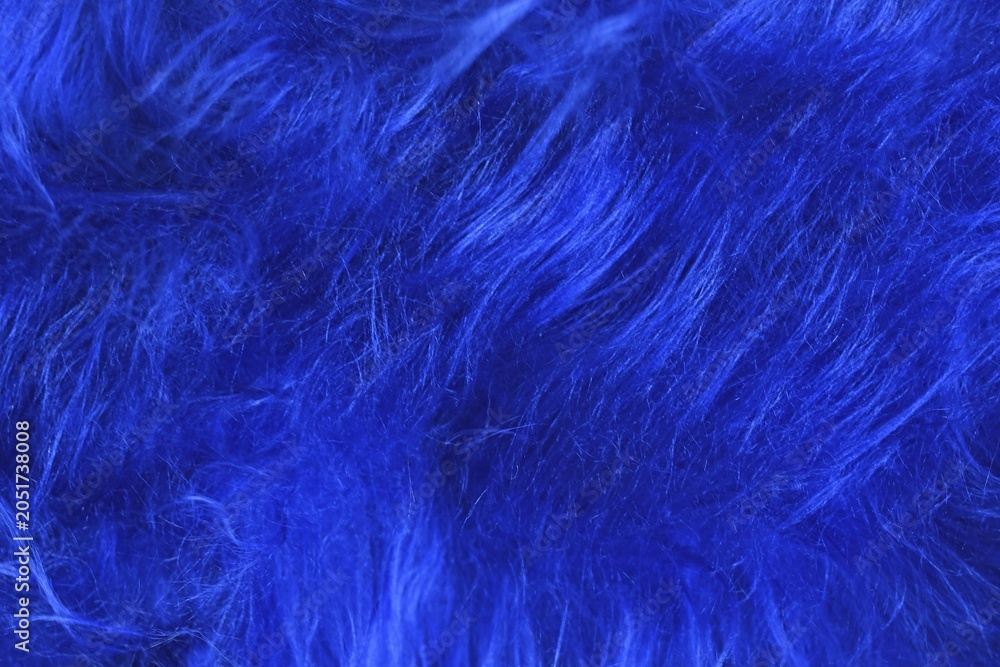Obraz premium Close up of bright blue tousled synthetic fake fur, AI generated
