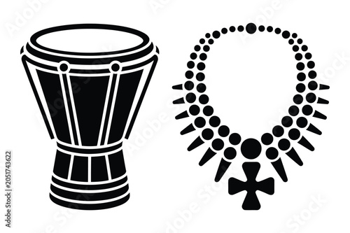 Foto Black and white silhouette icons of an ethnic drum and an ornamental cross neckl