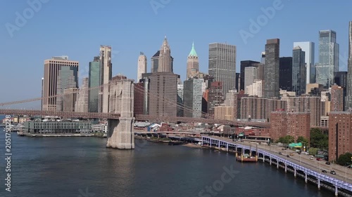 Iconic view of the Brooklyn Bridge and the Lower Manhattan skyline in New York City.