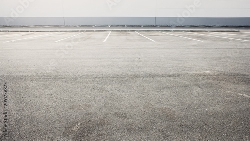 Empty Parking Lot with Concrete Pavement