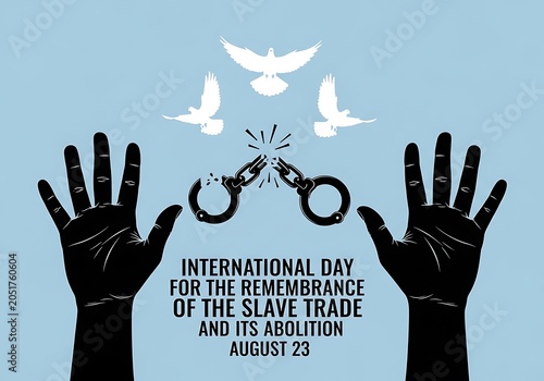 Hands breaking chains with dove symbolizing freedom and abolition on International Day for Slave Trade Remembrance