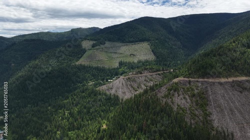 Aerial of Idaho forest and mined hillsides near in Coeur Dalene national forest near Osburn Idaho in spring