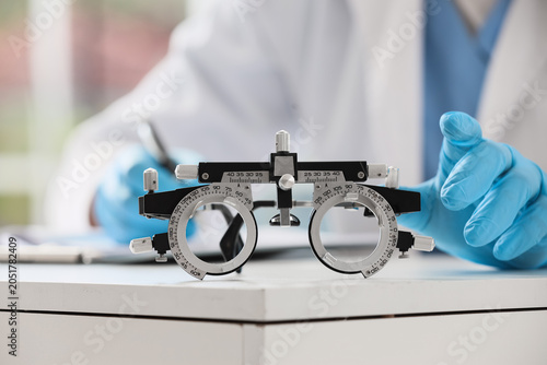 Trial frame on desk against...