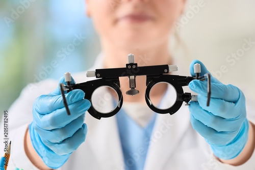Female ophthalmologist with...