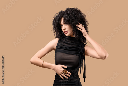 Beautiful young woman in cu...