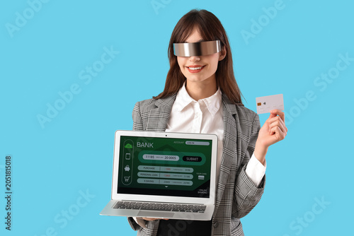 Young businesswoman in AR g...